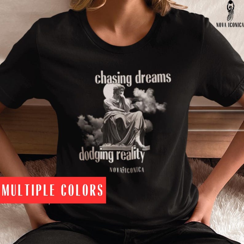 Chasing Dreams Dodging Reality Tee - Nova Iconica Inspirational Unisex T-Shirt"