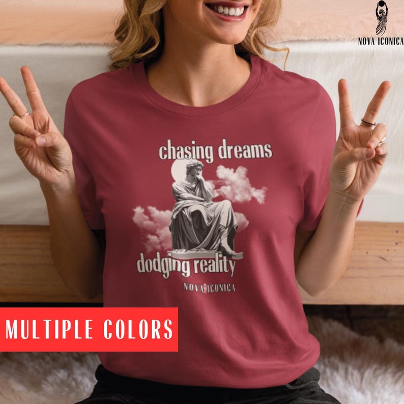 Person wearing Chasing Dreams Dodging Reality tee, casual outfit for everyday inspiration and style.